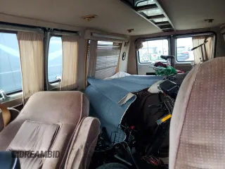 1989 Chevrolet Chevy Van z VIN 1GBEG25K2K7120100, wystawiony jako Copart lot #75508934 z przebiegiem Nie podano mil oraz Szkody całkowita. Historia ofert i sprzedaży dostępna na DreamBid. Obrazek 10.