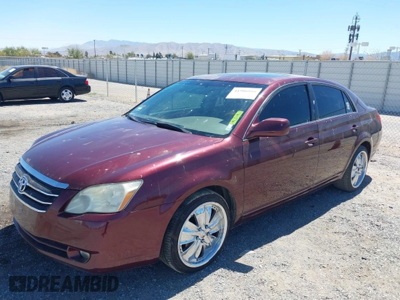 2006 Toyota Avalon XL with VIN 4T1BK36B36U087385, listed as a IAAI auction lot 41986866 with 128,594 mi miles. Bid and sale history available at carsss.com. Image 2.
