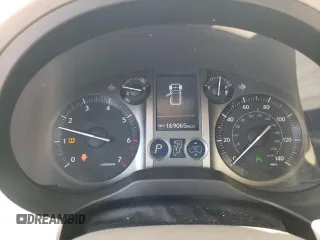 2010 Lexus GX 460 Premium with VIN JTJJM7FX6A5001418, listed as a Copart auction lot 52404285 with 169,065 mi miles and Salvage title. Bid and sale history available at DreamBid. Image 9.