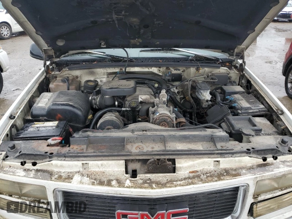 1997 GMC Suburban z VIN 1GKGK26JXVJ715765, wystawiony jako Copart lot #73188284 z przebiegiem 301 101 mil mil oraz Szkoda całkowita • Salvage title. Historia ofert i sprzedaży dostępna na DreamBid. Obrazek 12.