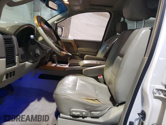 2007 Infiniti QX56 z VIN 5N3AA08C17N802122, wystawiony jako Copart lot #47050745 z przebiegiem 217 010 mil mil oraz Szkoda całkowita • Salvage title. Historia ofert i sprzedaży dostępna na DreamBid. Obrazek 7.