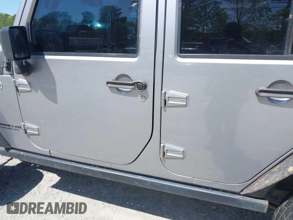 2014 Jeep Wrangler Unlimited Sport with VIN 1C4BJWDG4EL292421, listed as a IAAI auction lot 42034343 with 157,820 mi miles. Bid and sale history available at carsss.com. Image 14.