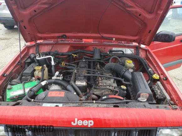 1998 Jeep Cherokee Sport with VIN 1J4FJ68S7WL275947, listed as a Copart auction lot 74333874 with 0 mi miles and Salvage Title. Bid and sale history available at carsss.com. Image 12.