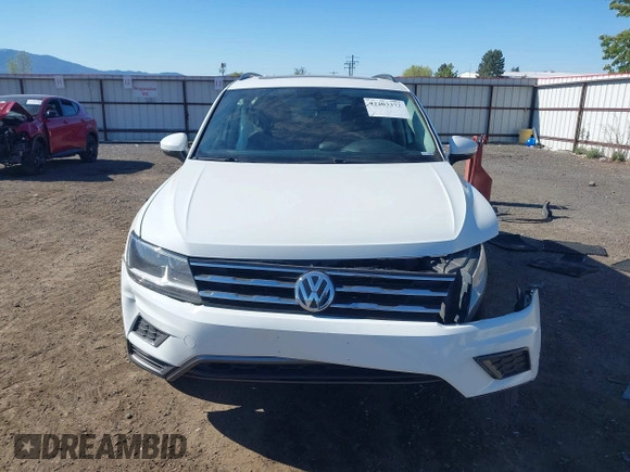 2020 Volkswagen Tiguan SE with VIN 3VV2B7AXXLM053170, listed as a IAAI auction lot 42203372 with 112,794 mi miles and . Bid and sale history available at DreamBid. Image 13.