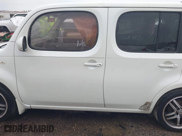 2009 Nissan Cube SL z VIN JN8AZ28R09T107493, wystawiony jako IAAI lot #41895404 z przebiegiem 190 656 mil mil oraz . Historia ofert i sprzedaży dostępna na DreamBid. Obrazek 14.