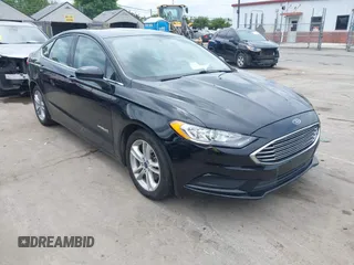 2018 Ford Fusion SE z VIN 3FA6P0LU2JR131863, wystawiony jako IAAI lot #42114451 z przebiegiem 153 148 mil mil oraz . Historia ofert i sprzedaży dostępna na DreamBid. Obrazek 1.