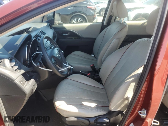 2012 Mazda 5 Grand Touring with VIN JM1CW2DLXC0139813, listed as a Copart auction lot 69896404 with 94,153 mi miles and Salvage Title. Bid and sale history available at DreamBid. Image 7.