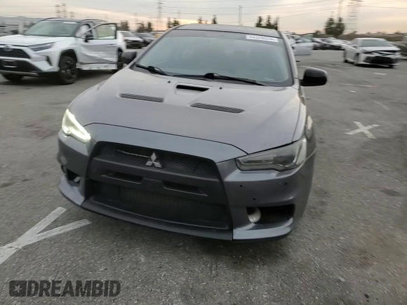 2010 Mitsubishi Lancer Evolution GSR with VIN JA32W8FV1AU027600, listed as a Copart auction lot 84328974 with 88,417 mi miles and Salvage Title. Bid and sale history available at DreamBid. Image 11.