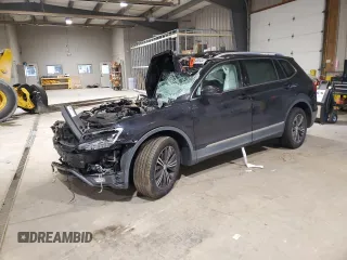 2018 Volkswagen Tiguan SEL z VIN 3VV2B7AX7JM164031, wystawiony jako Copart lot #52967265 z przebiegiem Nie podano mil oraz Szkoda całkowita • Salvage title. Historia ofert i sprzedaży dostępna na DreamBid. Obrazek 1.