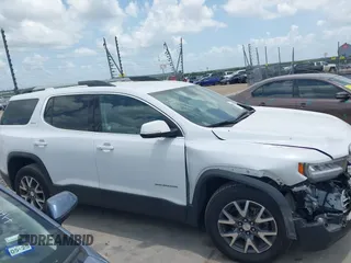 2023 GMC Acadia SLT with VIN 1GKKNUL45PZ201984, listed as a IAAI auction lot 42529929 with 52,263 mi miles and . Bid and sale history available at DreamBid. Image 13.