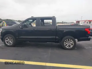 2023 Ford F-150 Lightning Pro with VIN 1FT6W1EV3PWG08587, listed as a IAAI auction lot 42418036 with Not provided miles and . Bid and sale history available at DreamBid. Image 13.