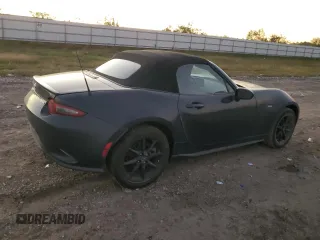 2021 Mazda MX-5 Miata Sport with VIN JM1NDAB79M0454876, listed as a Copart auction lot 82086434 with 74,035 mi miles and Salvage title. Bid and sale history available at DreamBid. Image 3.