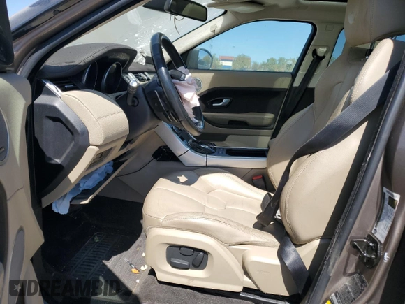 2015 Land Rover Range Rover Evoque Pure Premium z VIN SALVR2BG9FH005735, wystawiony jako Copart lot #69971924 z przebiegiem Nie podano mil oraz Szkoda całkowita • Salvage title. Historia ofert i sprzedaży dostępna na DreamBid. Obrazek 7.