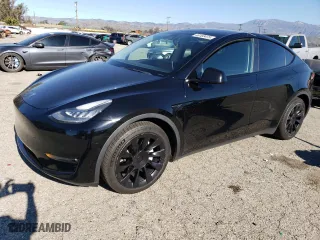 2021 Tesla Model Y Long Range with VIN 5YJYGAEE0MF115648, listed as a Copart auction lot 46153475 with 85,169 mi miles and Salvage Title. Bid and sale history available at carsss.com. Image 1.