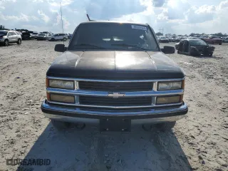 1999 Chevrolet Tahoe Z71 with VIN 1GNEK13R1XJ380316, listed as a Copart auction lot 68505524 with 242,542 mi miles and Salvage Title. Bid and sale history available at carsss.com. Image 5.