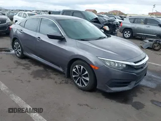 2017 Honda Civic LX z VIN 19XFC2F50HE055888, wystawiony jako IAAI lot #42202494 z przebiegiem 147 354 mil mil oraz . Historia ofert i sprzedaży dostępna na DreamBid. Obrazek 1.
