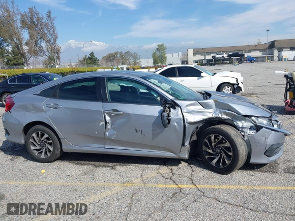 2016 Honda Civic Sedan EX with VIN 2HGFC2F74GH563268, listed as a IAAI auction lot 41805038 with 125,577 mi miles. Bid and sale history available at carsss.com. Image 13.