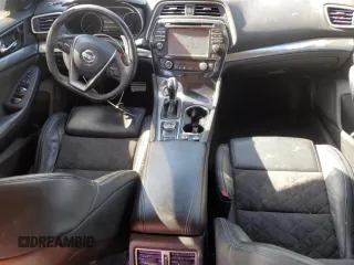 2016 Nissan Maxima SR z VIN 1N4AA6AP1GC446804, wystawiony jako Copart lot #53394825 z przebiegiem 226 421 mil mil oraz Szkoda całkowita • Salvage title. Historia ofert i sprzedaży dostępna na DreamBid. Obrazek 8.