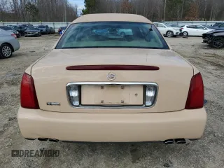 2004 Cadillac DeVille Limousine z VIN 1GEEH90Y34U550632, wystawiony jako Copart lot #47804485 z przebiegiem 54 382 mil mil oraz Czysty tytuł • Clean title. Historia ofert i sprzedaży dostępna na DreamBid. Obrazek 6.