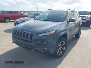 2014 Jeep Cherokee Trailhawk z VIN 1C4PJMBS2EW161276, wystawiony jako IAAI lot #42283358 z przebiegiem 135 201 mil mil oraz . Historia ofert i sprzedaży dostępna na DreamBid. Obrazek 17.