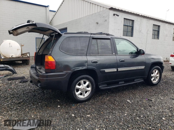 2005 GMC Envoy SLE with VIN 1GKDT13S052226910, listed as a Copart auction lot 47732655 with 170,257 mi miles and Salvage Title. Bid and sale history available at carsss.com. Image 3.