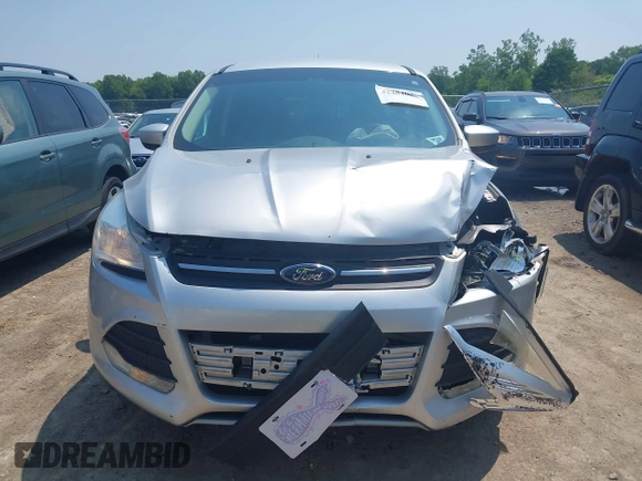 2014 Ford Escape SE with VIN 1FMCU9GX3EUC42964, listed as a IAAI auction lot 42484080 with 124,696 mi miles and . Bid and sale history available at DreamBid. Image 12.