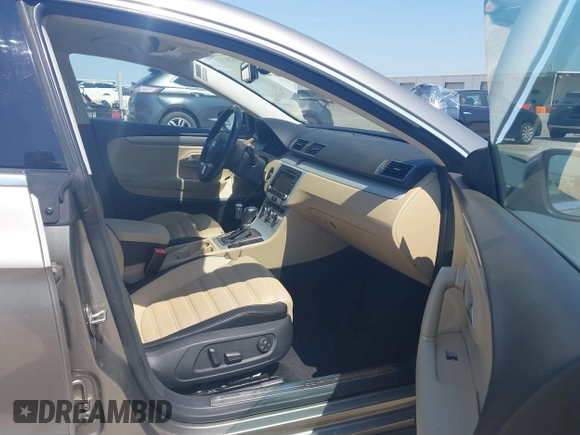 2013 Volkswagen CC Sport with VIN WVWBN7AN2DE555375, listed as a IAAI auction lot 42048643 with 125,484 mi miles and . Bid and sale history available at DreamBid. Image 5.