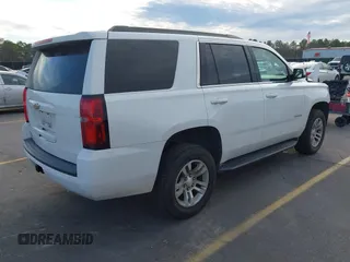 2020 Chevrolet Tahoe LS with VIN 1GNSCAKC6LR197289, listed as a IAAI auction lot 41429866 with 127,071 mi miles and . Bid and sale history available at DreamBid. Image 4.