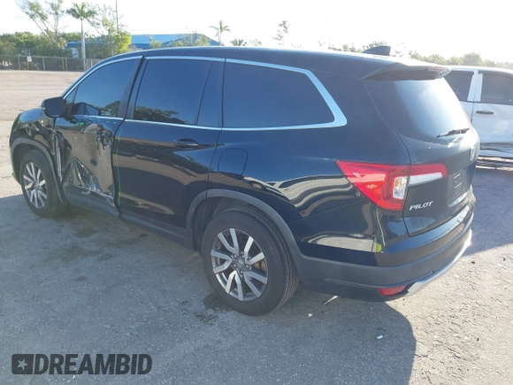 2021 Honda Pilot EX-L with VIN 5FNYF5H55MB044677, listed as a IAAI auction lot 42038704 with 38,684 mi miles and . Bid and sale history available at carsss.com. Image 3.