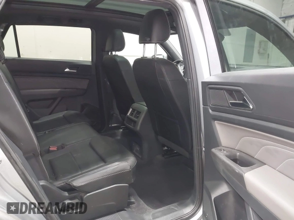 2023 Volkswagen Atlas SE z VIN 1V2KC2CA6PC210593, wystawiony jako IAAI lot #41957633 z przebiegiem 34 801 mil mil oraz . Historia ofert i sprzedaży dostępna na DreamBid. Obrazek 8.