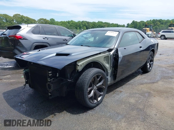 2018 Dodge Challenger SXT z VIN 2C3CDZAG1JH143140, wystawiony jako IAAI lot #42289674 z przebiegiem 79 764 mil mil oraz . Historia ofert i sprzedaży dostępna na DreamBid. Obrazek 19.