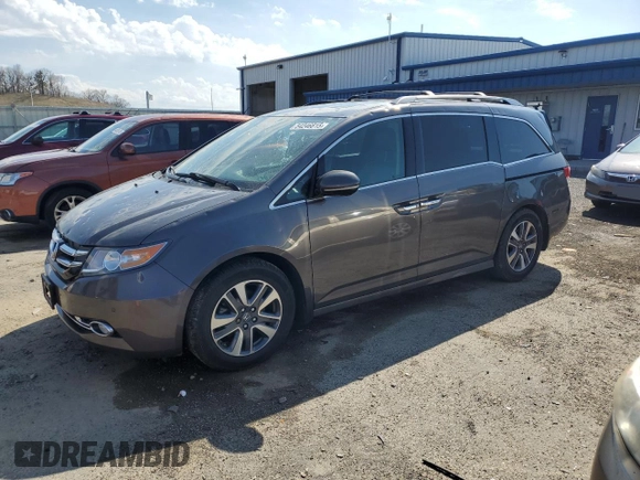 2017 Honda Odyssey Touring with VIN 5FNRL5H91HB013660, listed as a Copart auction lot 54246815 with 79,501 mi miles and Clean title. Bid and sale history available at DreamBid. Image 1.