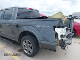 2018 Ford F-150 XL z VIN 1FTEW1CP7JKD52775, wystawiony jako IAAI lot #39938516 z przebiegiem 119 042 mil mil oraz . Historia ofert i sprzedaży dostępna na DreamBid. Obrazek 18.