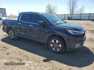 2018 Honda Ridgeline RTL-E with VIN 5FPYK3F76JB014174, listed as a Copart auction lot 52536524 with 95,822 mi miles and Clean title. Bid and sale history available at DreamBid. Image 4.