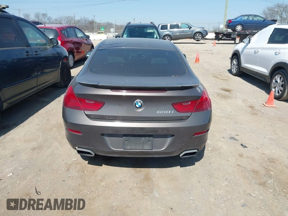 2012 BMW 6 Series 650i z VIN WBALX3C57CC528832, wystawiony jako IAAI lot #41779268 z przebiegiem 75 119 mil mil oraz . Historia ofert i sprzedaży dostępna na DreamBid. Obrazek 16.