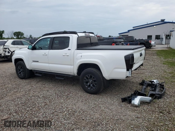 2023 Toyota Tacoma SR with VIN 3TMCZ5AN2PM642205, listed as a Copart auction lot 61045955 with 10,596 mi miles and Salvage title. Bid and sale history available at DreamBid. Image 2.