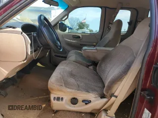1999 Ford F-150 XL z VIN 1FTRX18L3XNA61248, wystawiony jako Copart lot #56355005 z przebiegiem Nie podano mil oraz Nie do naprawy • Non repairable. Historia ofert i sprzedaży dostępna na DreamBid. Obrazek 7.