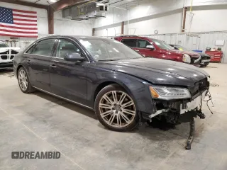 2015 Audi A8 3.0T z VIN WAU3GAFD3FN005842, wystawiony jako Copart lot #44649445 z przebiegiem 181 952 mil mil oraz Czysty tytuł • Clean title. Historia ofert i sprzedaży dostępna na DreamBid. Obrazek 4.