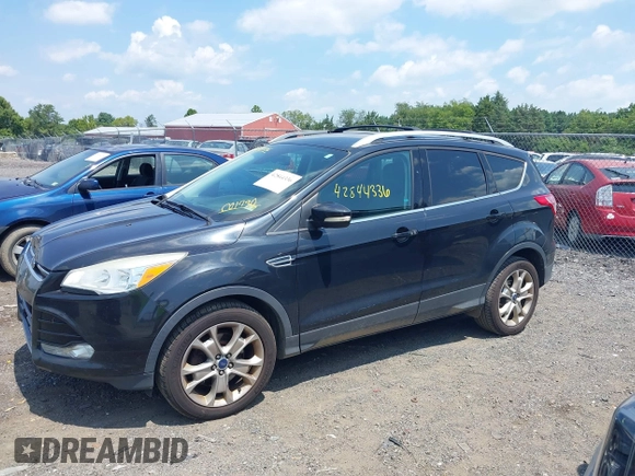 2015 Ford Escape Titanium with VIN 1FMCU9J96FUC01790, listed as a IAAI auction lot 42844336 with 133,005 mi miles and . Bid and sale history available at DreamBid. Image 14.