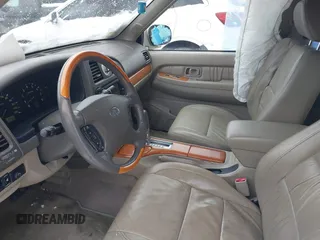 2002 Infiniti QX4 Luxury z VIN JNRDR09Y02W256431, wystawiony jako IAAI lot #41528658 z przebiegiem 76 077 mil mil oraz . Historia ofert i sprzedaży dostępna na DreamBid. Obrazek 5.