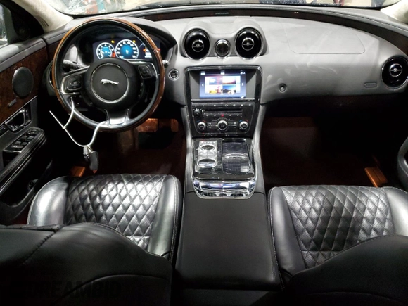 2017 Jaguar XJ with VIN SAJWJ2GDXH8W08618, listed as a Copart auction lot 44168345 with 76,782 mi miles and Clean Title. Bid and sale history available at carsss.com. Image 8.