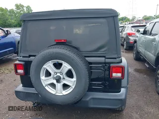 2018 Jeep Wrangler Unlimited Sport S with VIN 1C4HJXDG3JW150232, listed as a IAAI auction lot 42379385 with 60,679 mi miles and . Bid and sale history available at DreamBid. Image 16.