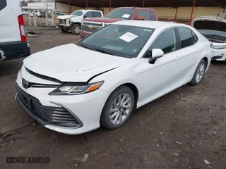 2024 Toyota Camry LE with VIN 4T1C11AK5RU899617, listed as a IAAI auction lot 41810634 with 24,295 mi miles. Bid and sale history available at carsss.com. Image 18.