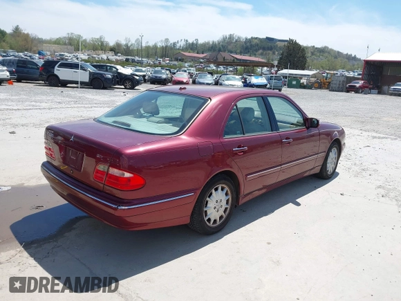 2000 Mercedes-Benz E-Class with VIN WDBJF65J1YB018240, listed as a IAAI auction lot 42051187 with 186,651 mi miles. Bid and sale history available at carsss.com. Image 4.