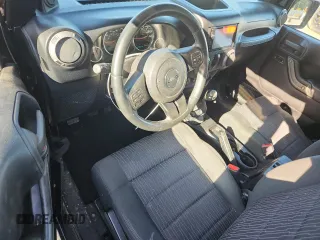 2012 Jeep Wrangler Sport with VIN 1C4AJWAG5CL273292, listed as a Copart auction lot 60135395 with 123,874 mi miles and Salvage title. Bid and sale history available at DreamBid. Image 8.