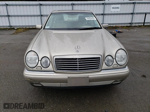 1999 Mercedes-Benz E-Class with VIN WDBJF82H2XX015586, listed as a Copart auction lot 44465455 with 76,890 mi miles and Salvage Title. Bid and sale history available at carsss.com. Image 5.