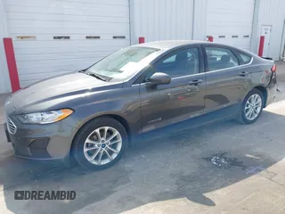 2019 Ford Fusion Hybrid SE with VIN 3FA6P0LU6KR163927, listed as a IAAI auction lot 41834612 with 104,342 mi miles. Bid and sale history available at carsss.com. Image 18.