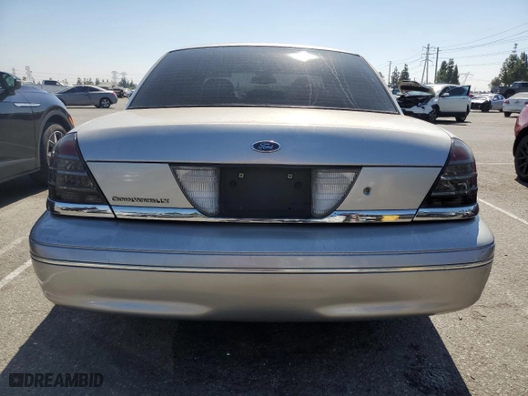 2004 Ford Crown Victoria LX with VIN 2FAFP74W44X184918, listed as a Copart auction lot 73346744 with 157,925 mi miles and Salvage Title. Bid and sale history available at carsss.com. Image 6.