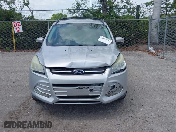 2013 Ford Escape SEL with VIN 1FMCU0H97DUD95194, listed as a IAAI auction lot 42052786 with 145,616 mi miles. Bid and sale history available at carsss.com. Image 12.