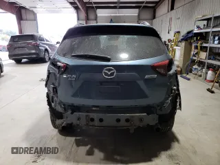 2016 Mazda CX-5 Grand Touring with VIN JM3KE4DY1G0714674, listed as a Copart auction lot 75516524 with 115,766 mi miles and Salvage Title. Bid and sale history available at carsss.com. Image 6.